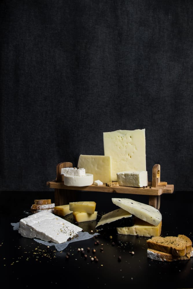Traditional,Greek,Cheeses,On,A,Dark,Background